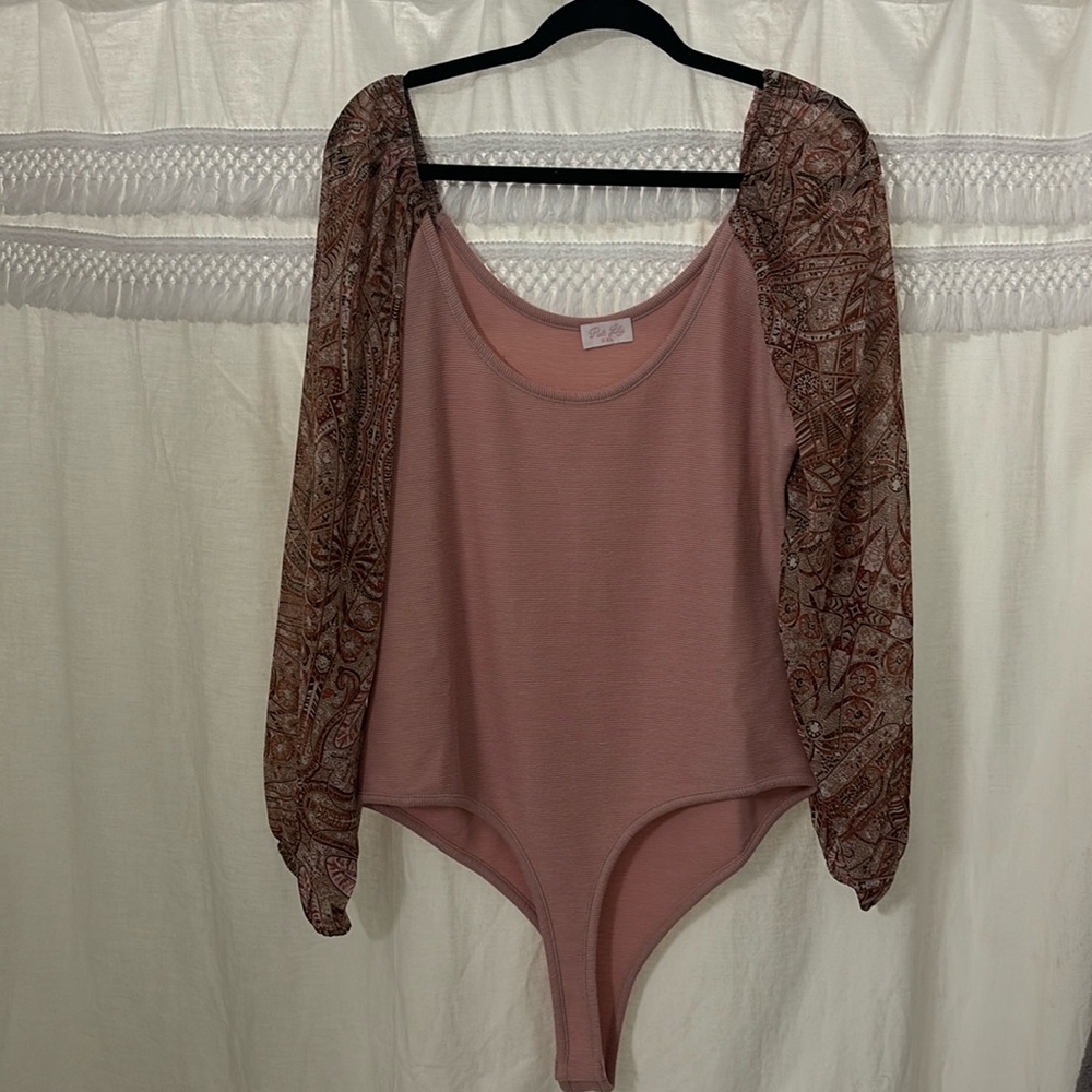 Pink lily body suit